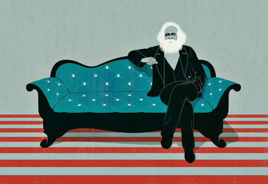 Portrait of Karl Marx sitting on a United States flag